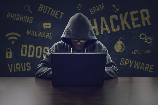 hacker hoodie mask on laptop virus vpn services security 